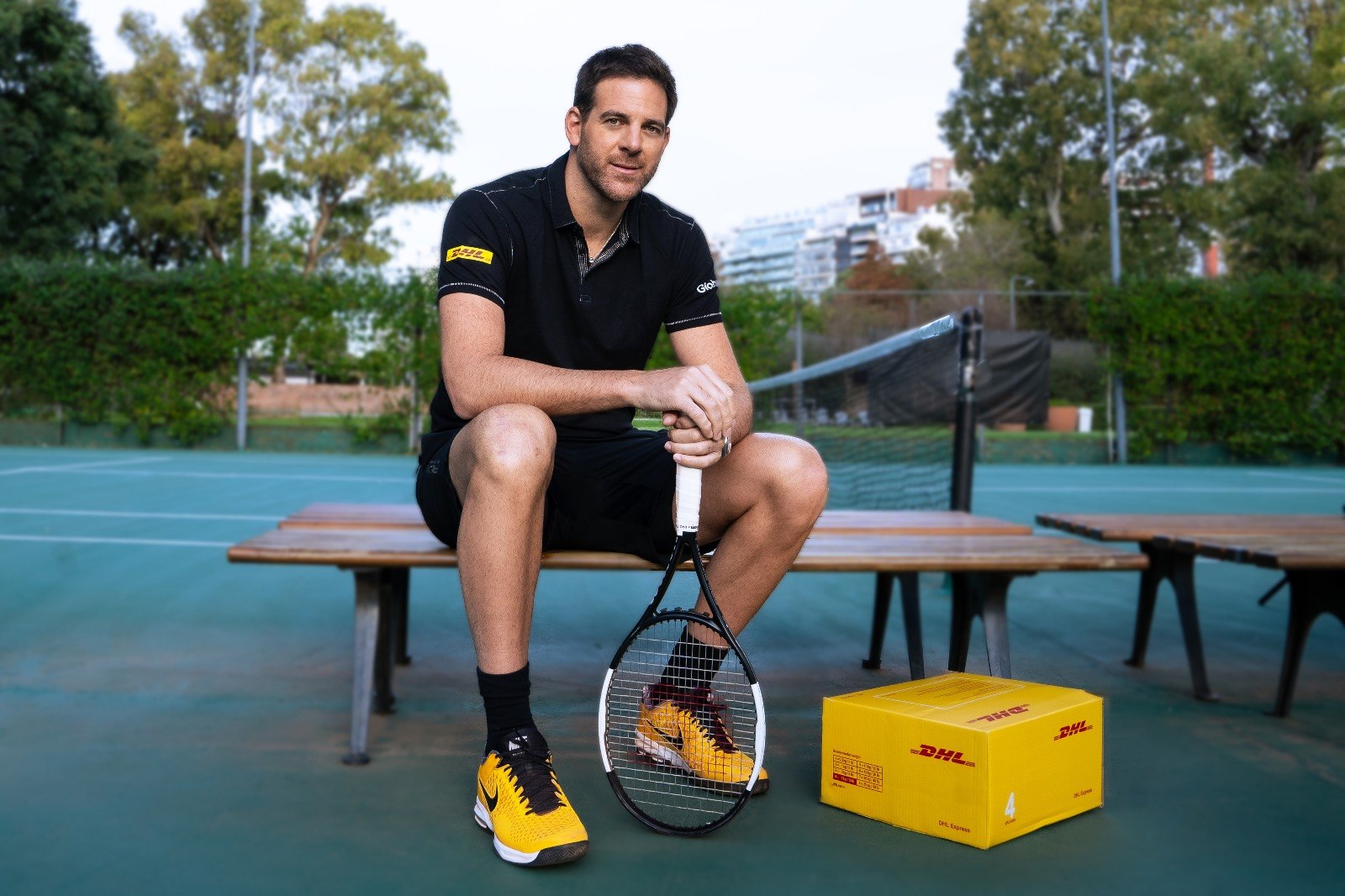 Juan Martín del Potro — sesión en cancha con caja DHL